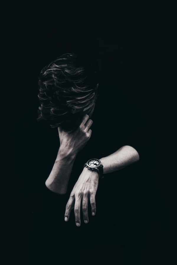 Cool Sad Boy Holding His Face Wallpaper