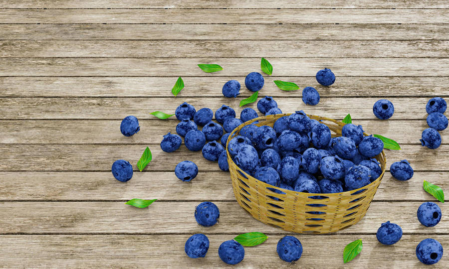 Country Style Blueberries On A Rustic Wooden Table Wallpaper