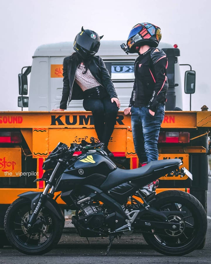 Couple With Black Yamaha Mt 15 Wallpaper