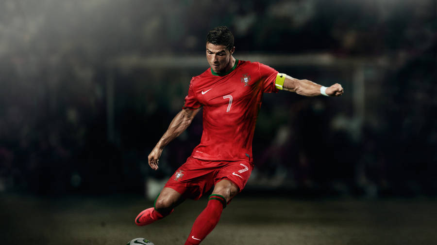 Cr7 Hd Kicking Football Wallpaper