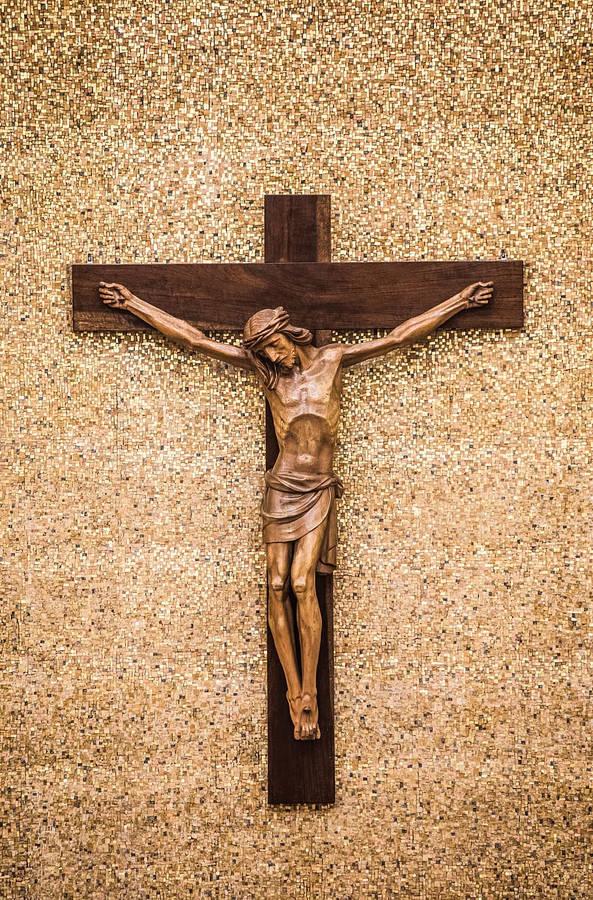 Crucifixion Statue Against Mosaic Background Wallpaper