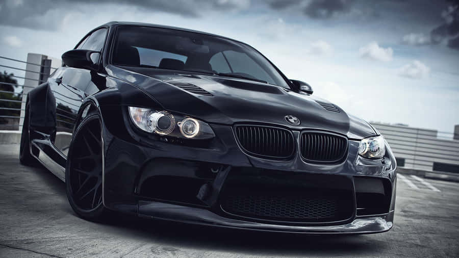 Cruise In Luxury With A Bmw Car Wallpaper