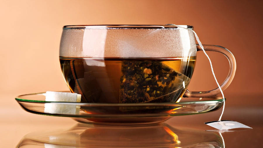 Cup With Tea Bag Wallpaper