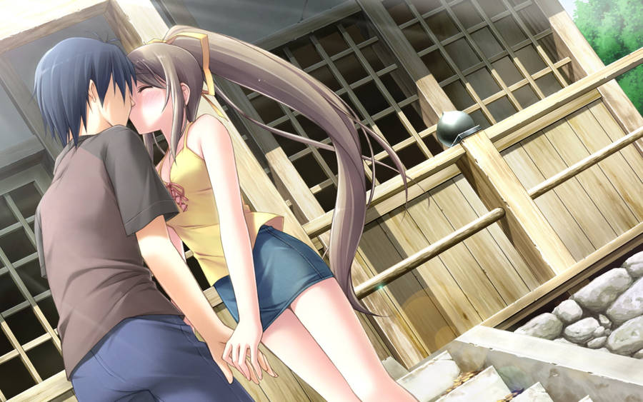 Cute Anime Couple Kissing Outdoors Wallpaper