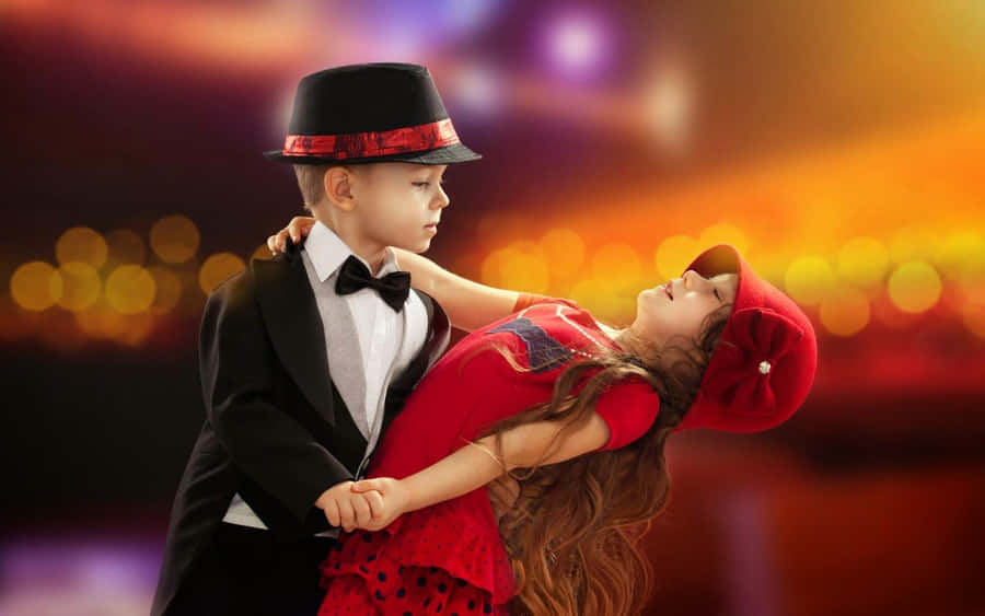 Cute Baby Couple Sweet Dancing Wallpaper