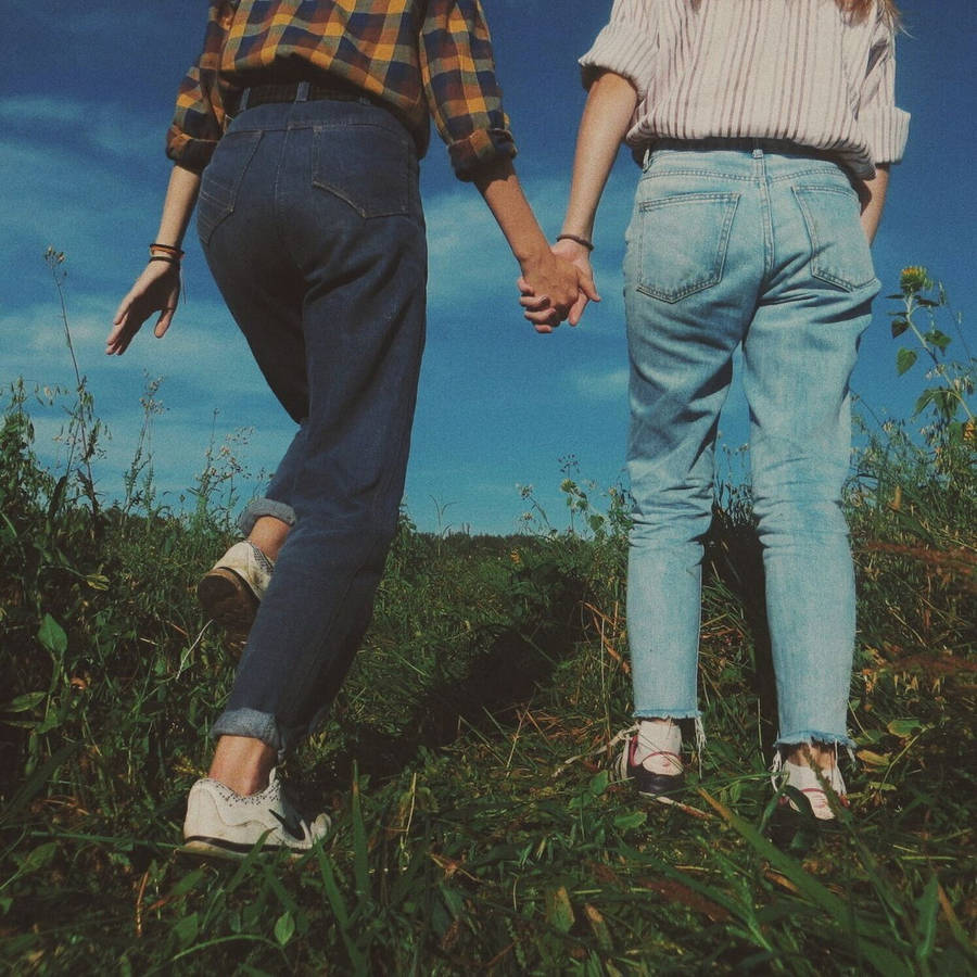 Cute Best Friend Holding Hands Wallpaper