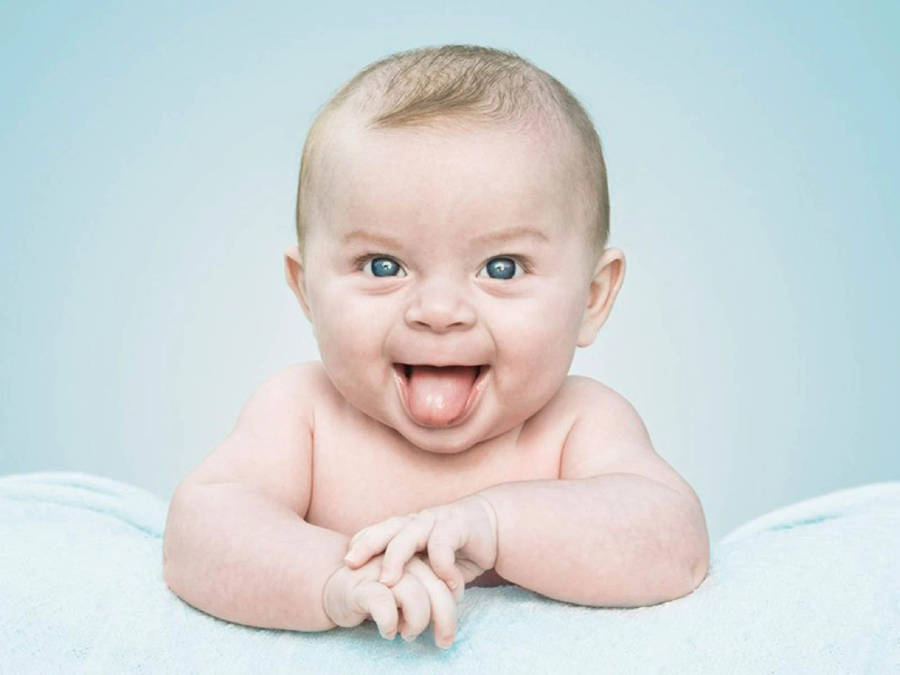 Cute Blue-eyed Funny Baby Wallpaper