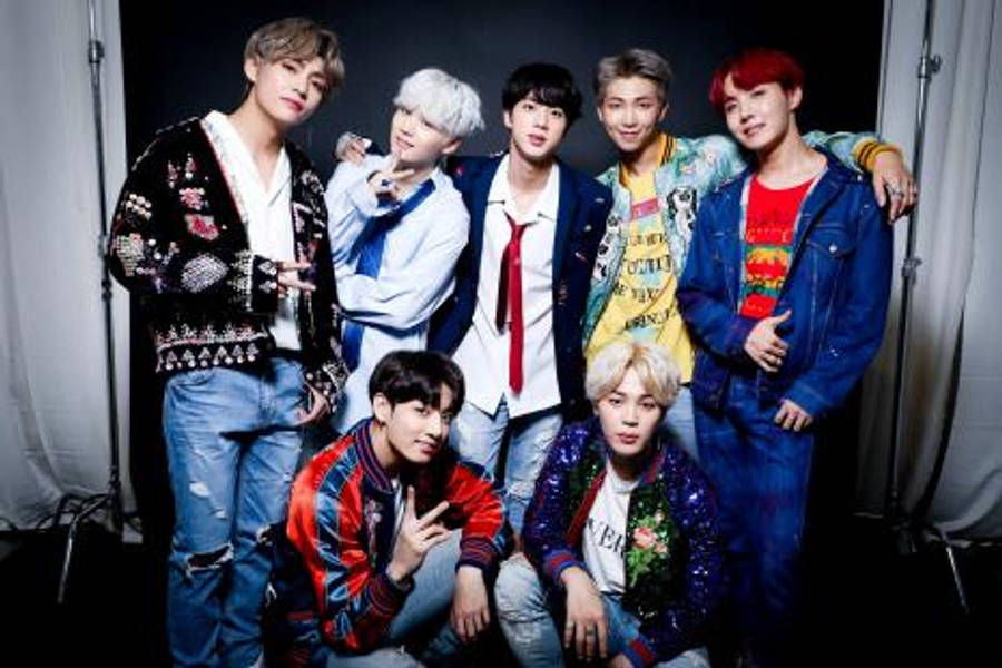 Cute Bts Group Wearing Messy Clothing Wallpaper