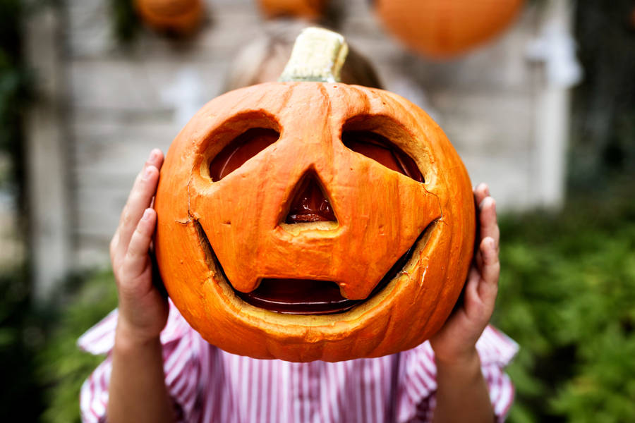 Cute Halloween Kid Jack O' Lantern Wallpaper