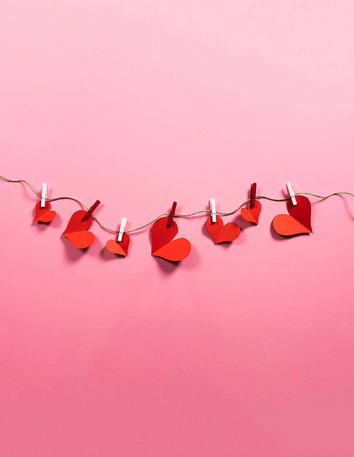 Cute Hd Heart Cut-out On String Wallpaper