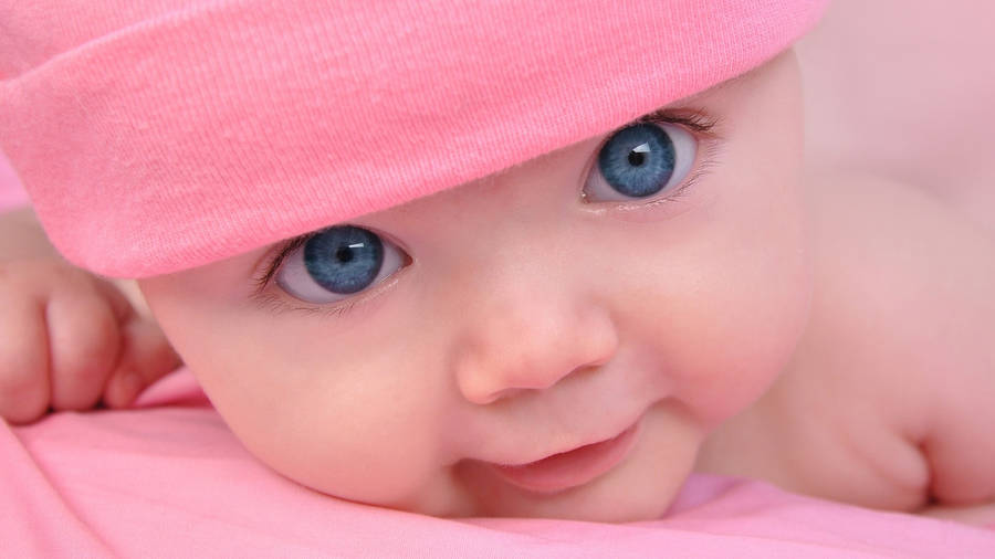 Cute Pink Baby Girl Blue Eyes Wallpaper