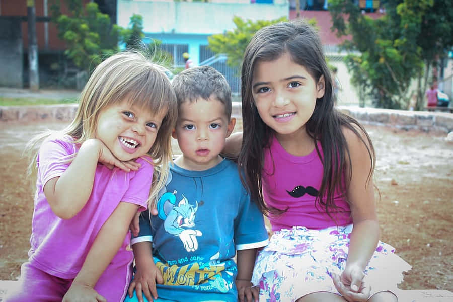 Cute Sister And Siblings Playground Bonding Wallpaper