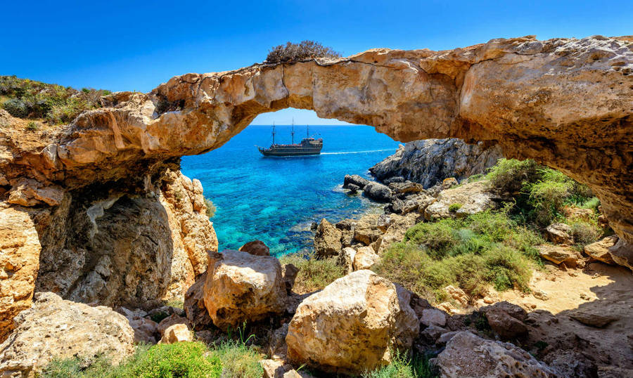 Cyprus Rock Bridge And Ship Wallpaper