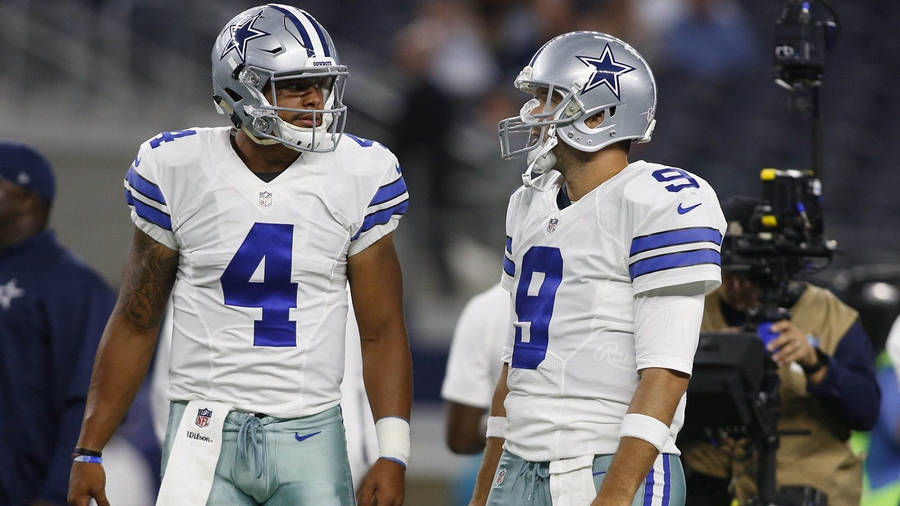 Dak Prescott With Tony Romo - Moments Of Camaraderie On The Field Wallpaper