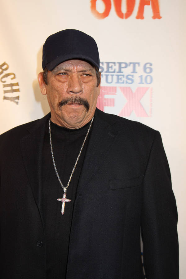 Danny Trejo Fierce Look In Black Wallpaper