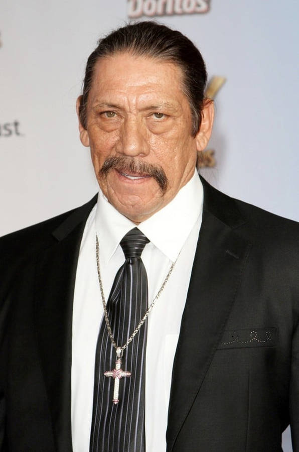 Danny Trejo In A Formal Suit Wallpaper