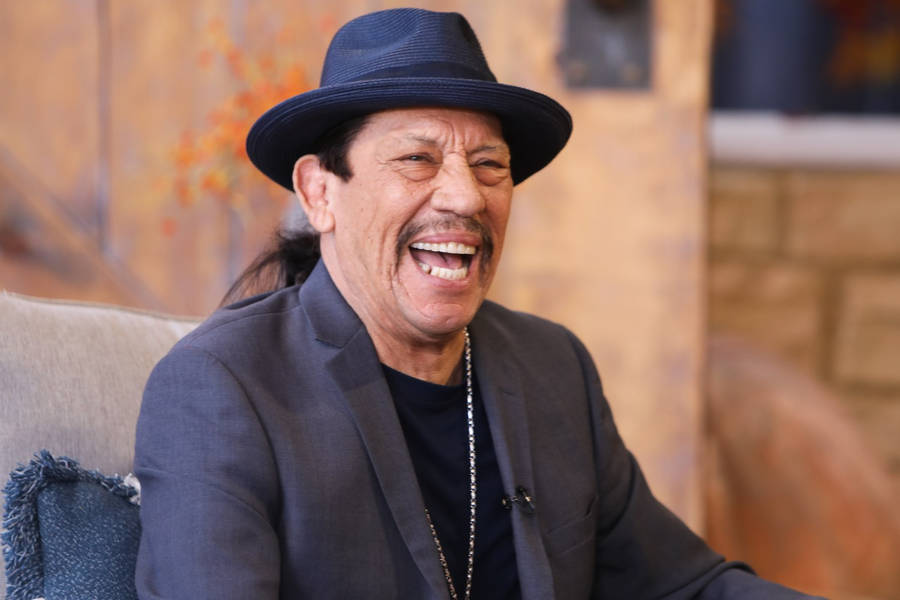 Danny Trejo Laughing In Talk Show Wallpaper