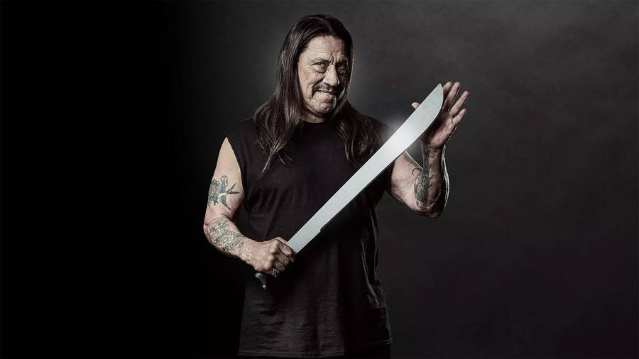 Danny Trejo With Silver Machete Wallpaper