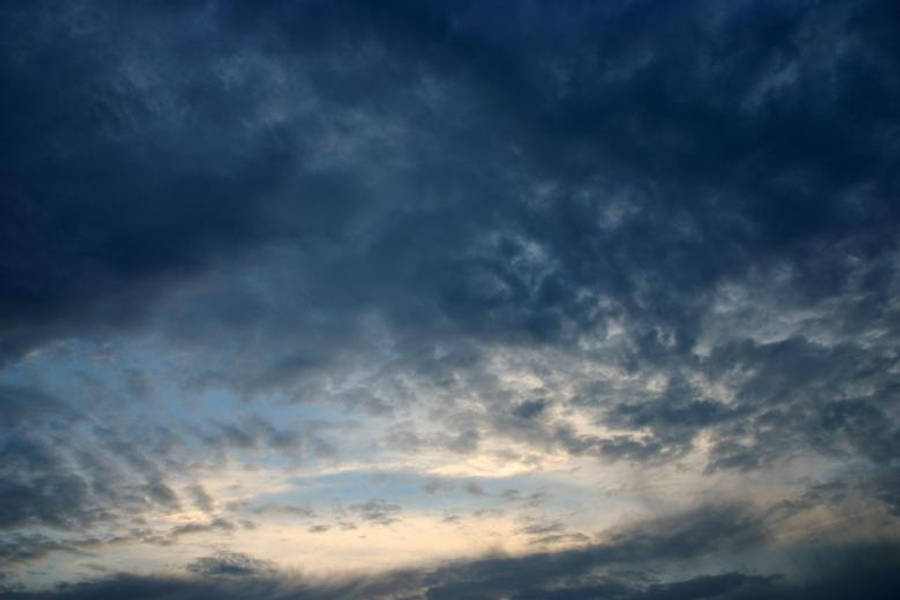 Dark Blue Clouds At Mid-day Wallpaper