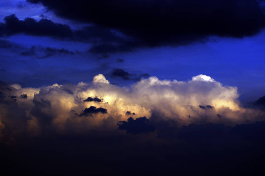 Dark Blue Clouds At Sunset Wallpaper