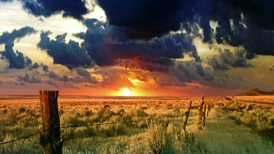 Dark Blue Clouds In The Countryside Wallpaper