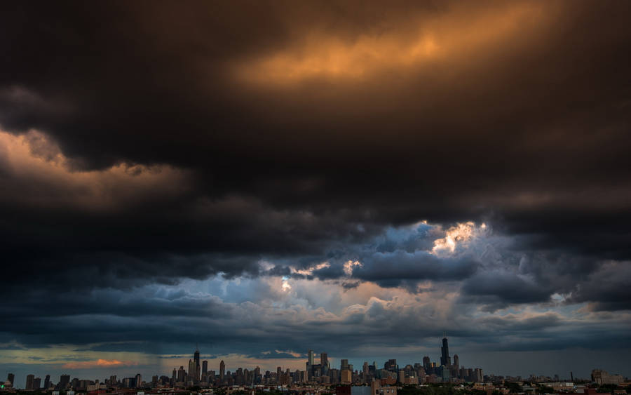 Dark Blue Clouds Over City Wallpaper