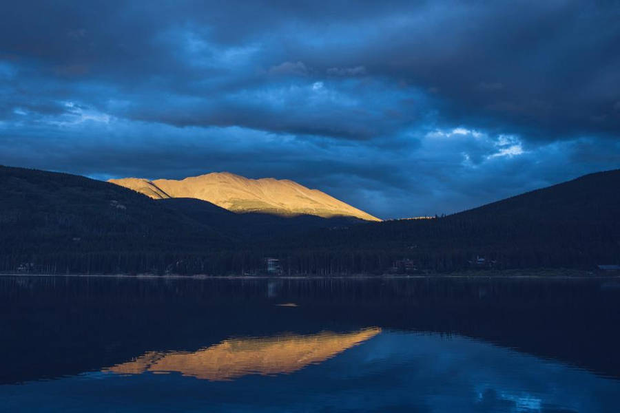 Dark Blue Clouds Over Lake Wallpaper