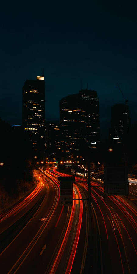 Dark Night And Busy Highway Wallpaper