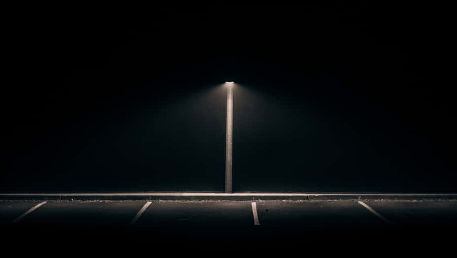 Dark Night At Street Parking Lot Wallpaper