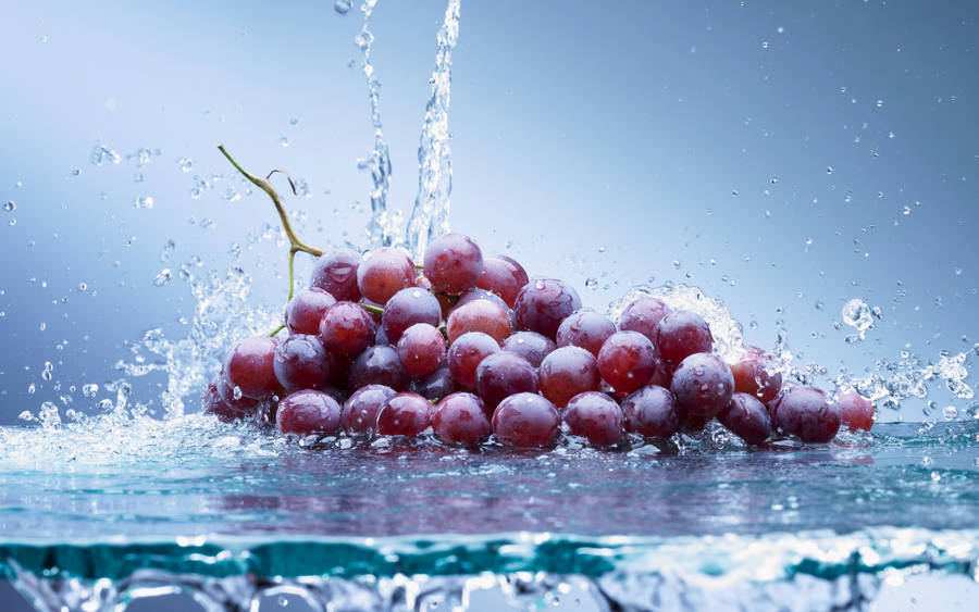 Dark Red Grape In Water Wallpaper