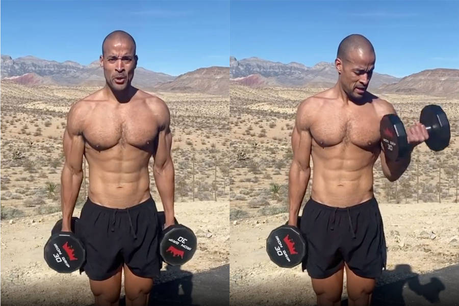 David Goggins Lifting In Desert Wallpaper