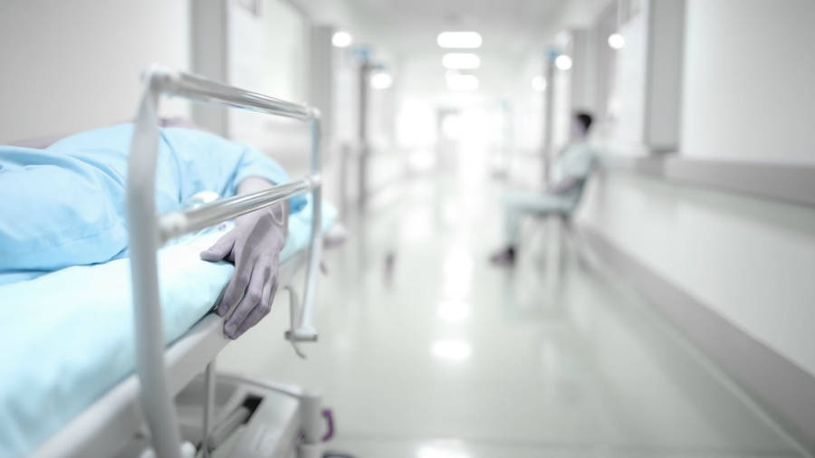 Deceased Patient In Hospital Hallway Wallpaper