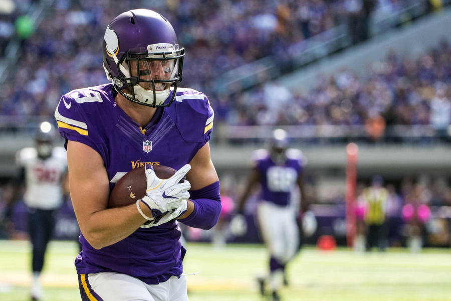 Defense Football Grip Adam Thielen Wallpaper