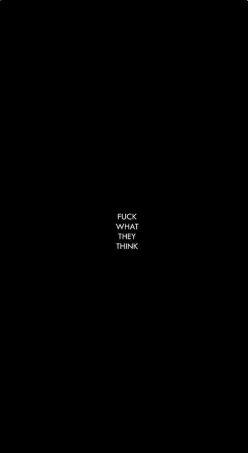 Defiant Statementon Black Background Wallpaper
