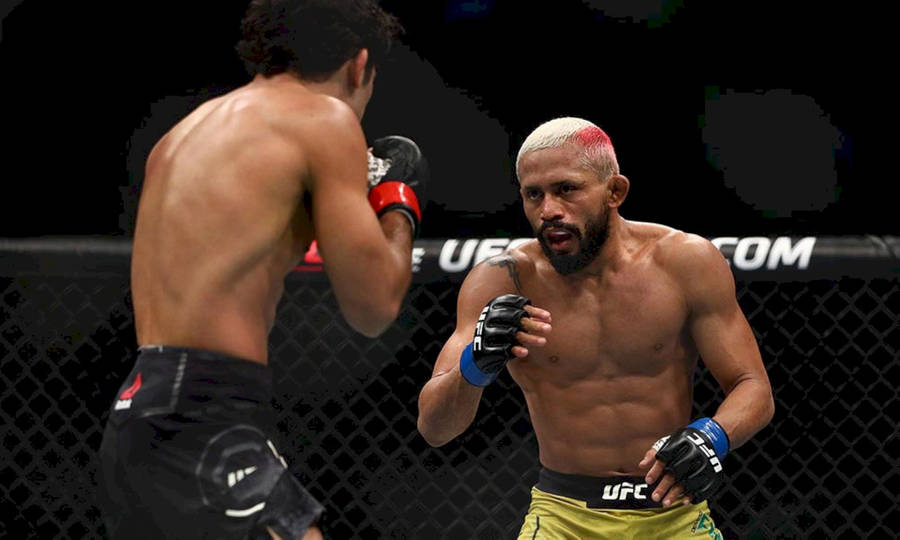 Deiveson Figueiredo In A Ufc Fight Wallpaper