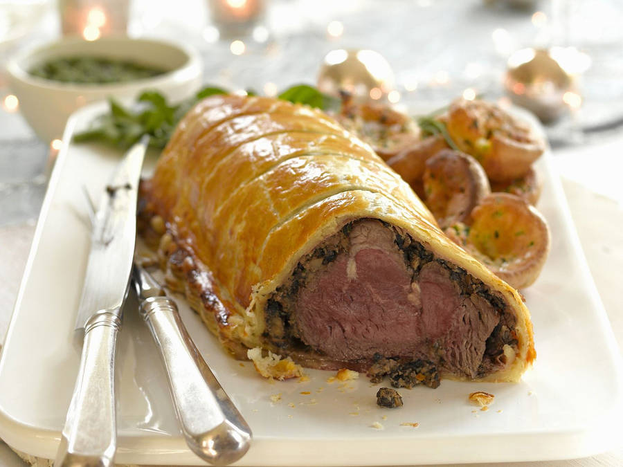 Delectable Beef Wellington Served Juicy And Fresh Wallpaper