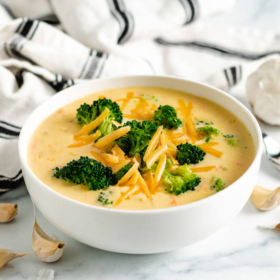 Delectable Broccoli Cheddar Soup In A Bowl Wallpaper