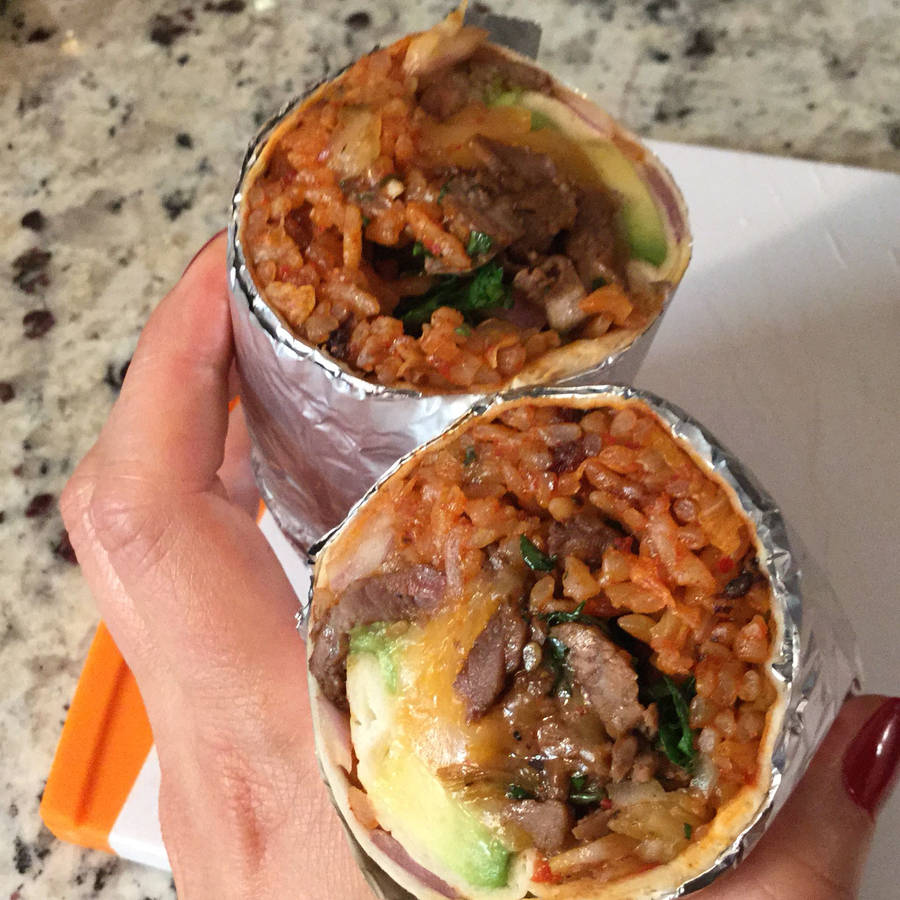 Delectable Burrito Stuffed With Spicy Kimchi Wallpaper