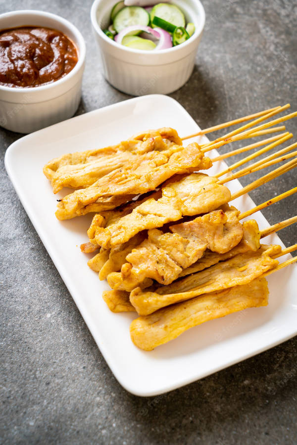 Delectable Chicken Satay - A Taste Of Southeast Asia Wallpaper