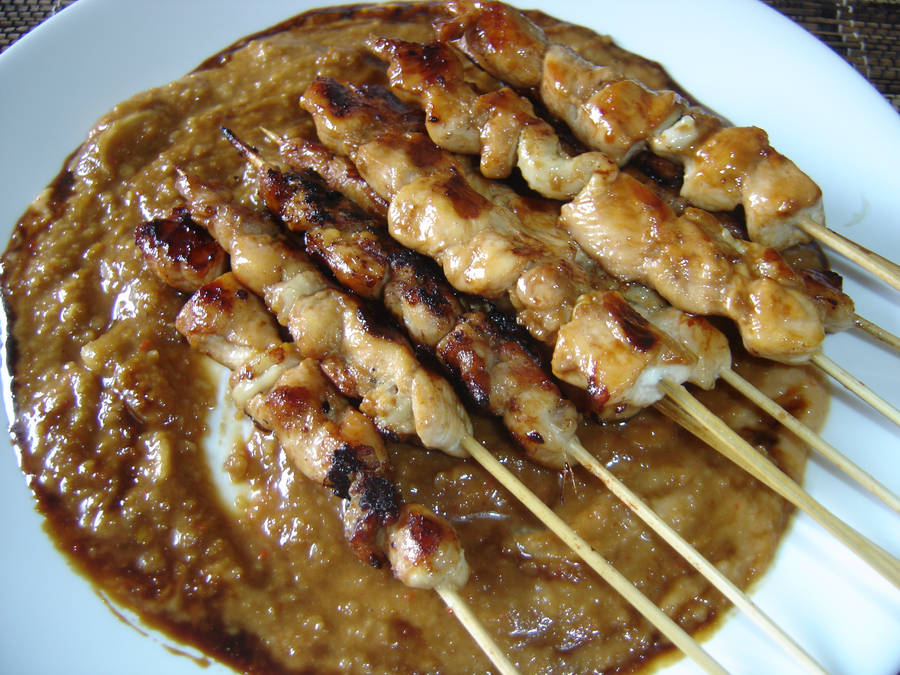 Delectable Chicken Satay With Savory Peanut Sauce Wallpaper