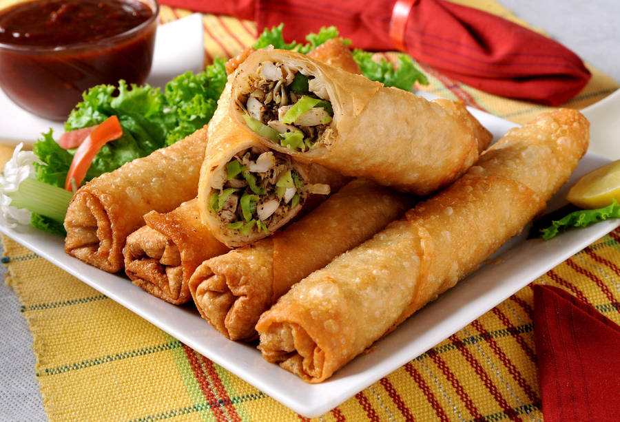 Delectable Sliced Spring Onion Egg Rolls Wallpaper