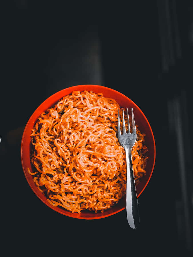 Delectable Yippee Instant Noodles In Red Bowl Wallpaper