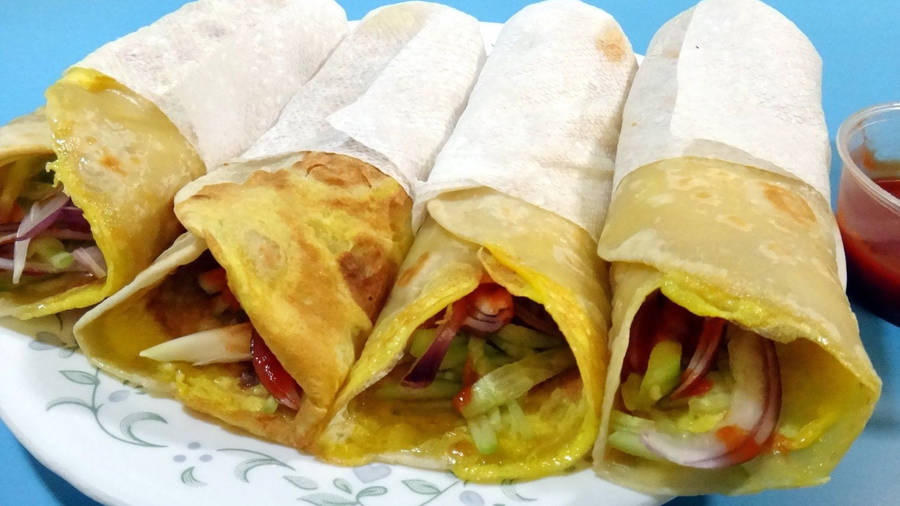 Delicious Egg Rolls Wrapped To Perfection Wallpaper