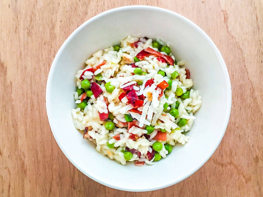 Delicious Ham And Peas Risotto Dish Wallpaper