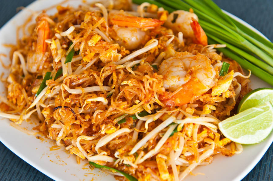 Delightful Platter Of Creamy Spicy Pad Thai Wallpaper