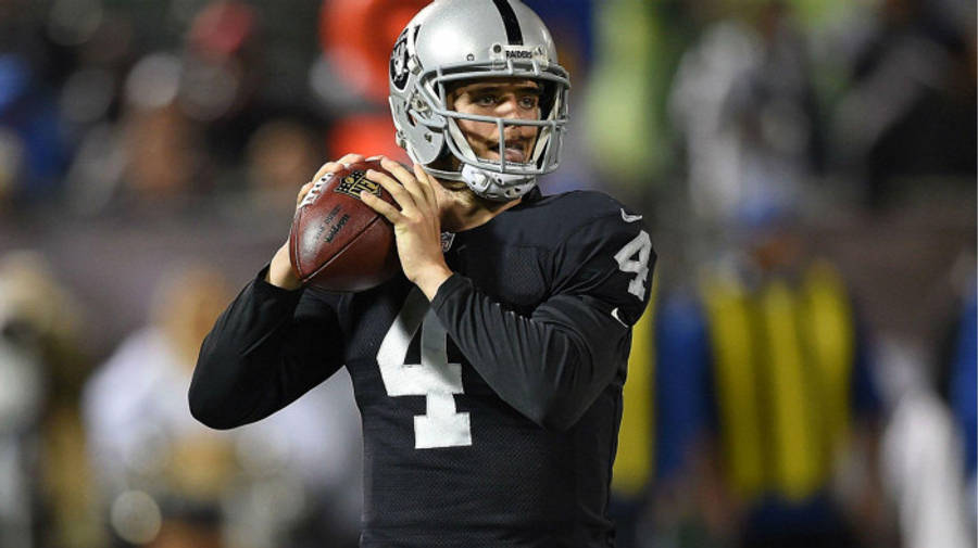 Derek Carr Holding The Football Wallpaper