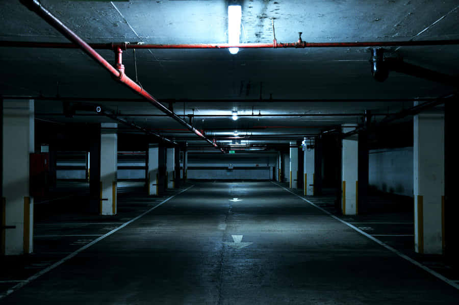 Desolate Dark Building Parking Lot Wallpaper