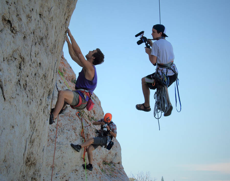 Determination Embodied: Intense Focus In Sport Climbing. Wallpaper