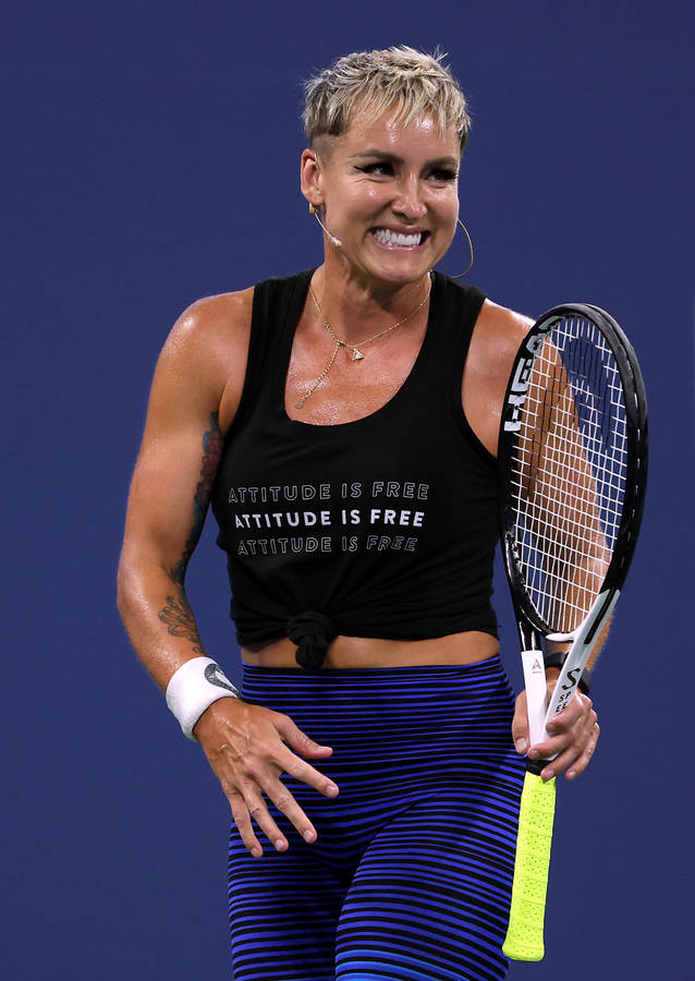 Determined Bethanie Mattek-sands With Her Signature Short Hair On Court Wallpaper