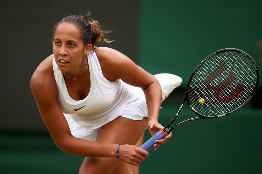 Determined Madison Keys In The Heat Of The Game Wallpaper